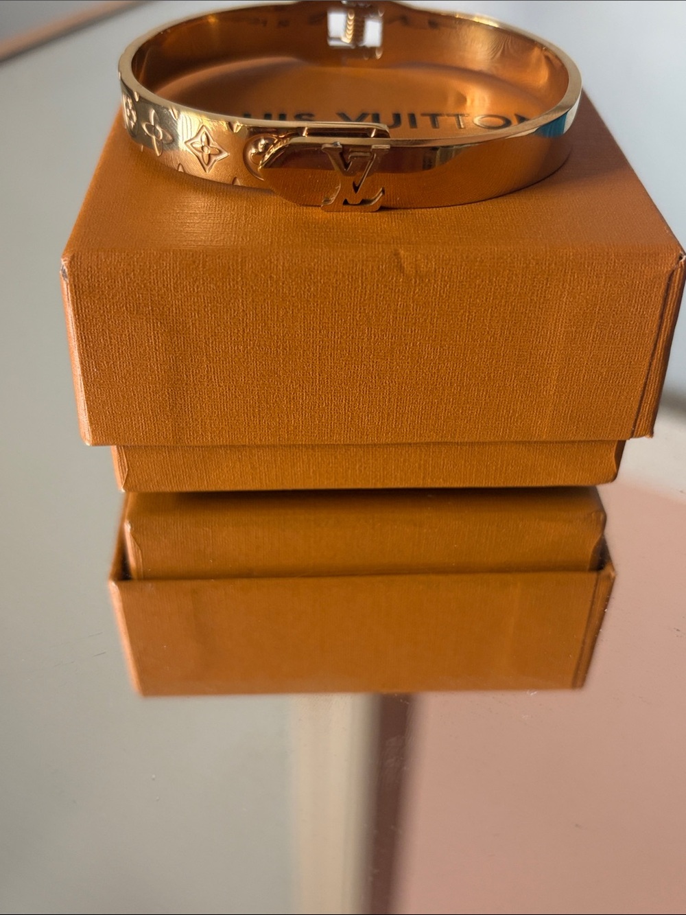 Louis Vuitton Gold Tone nanogram cuff bracelet
